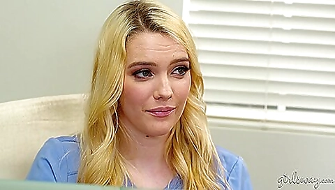 Nurse with big boobs is doing a massage to another nurse