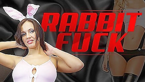 Brunette babe with a tattoo in a bunny costume is getting fucked