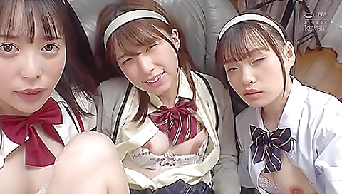 Asian threesome with three busty women in a porn video