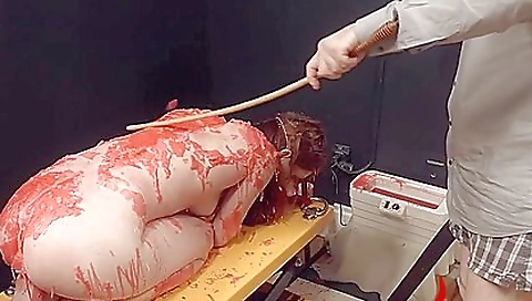 Hot woman is getting fucked in the ass in bondage video