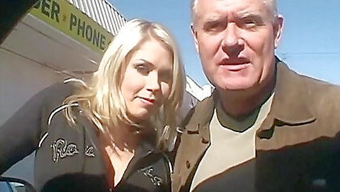 Busty blonde in a sexy bra and panties riding a black cock