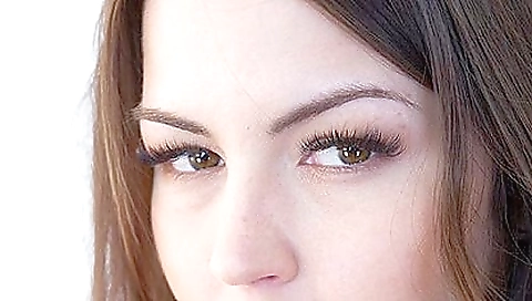 Mature woman touches her pussy with a huge vibrator